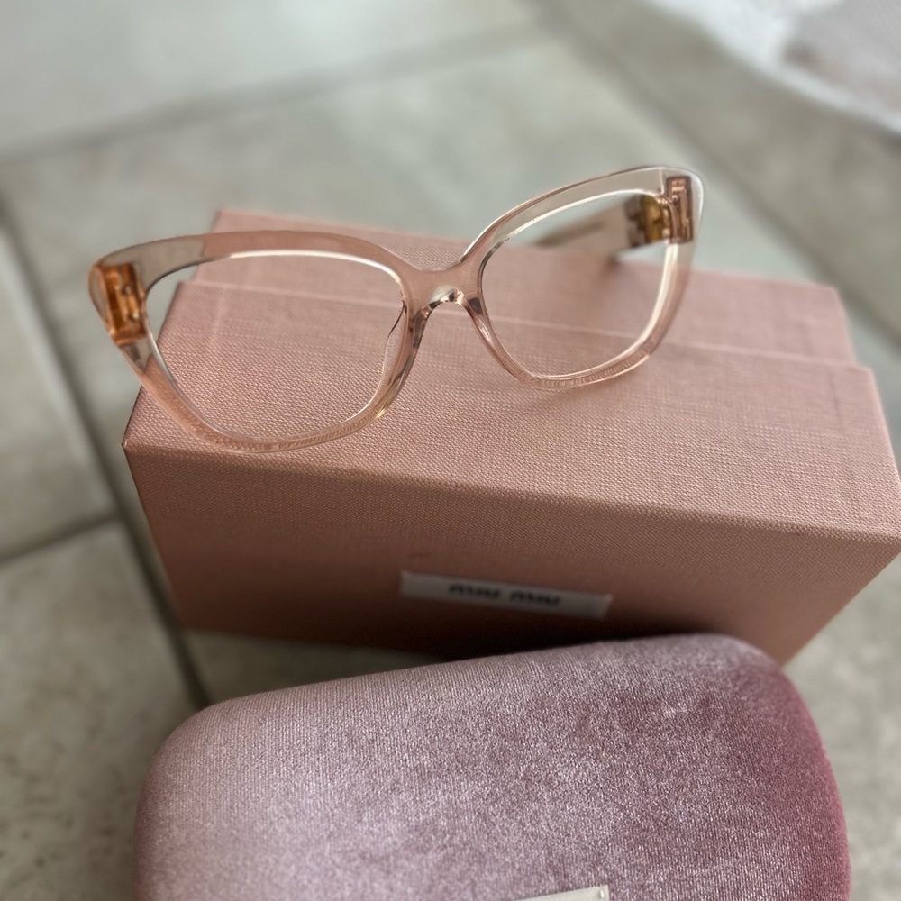 Miu Miu Pink Rectangular Glasses with Modern Design